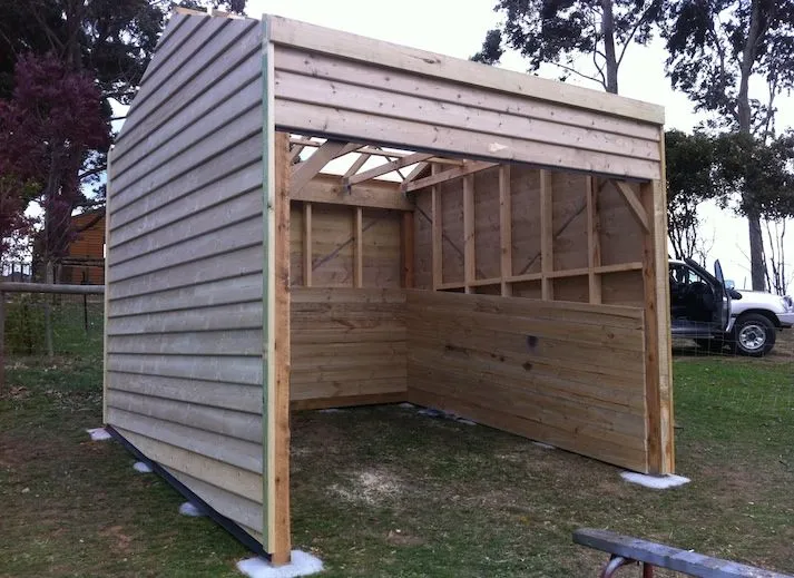 Timber-clad open shed