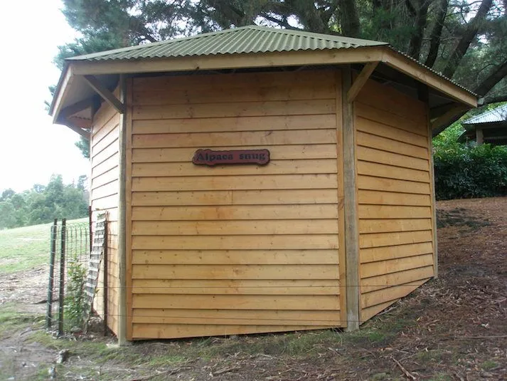 Timber shelter with hip roof
