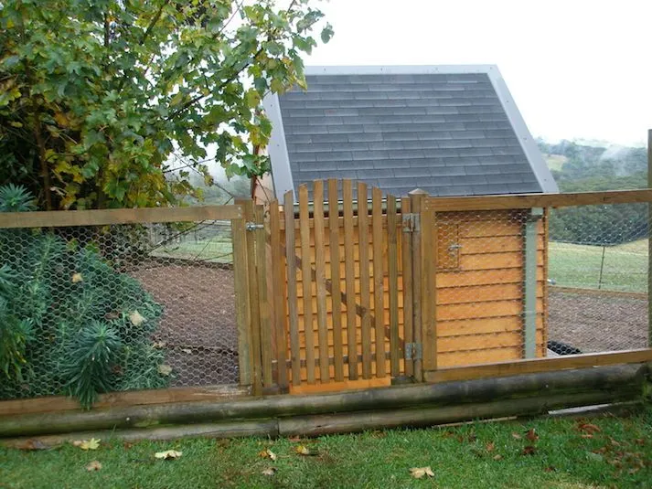 Timber gate and picket fence