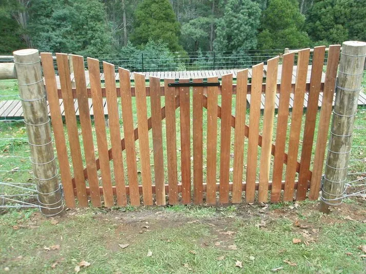 Curved-top timber farm gate